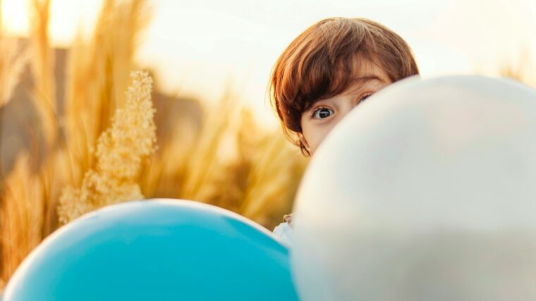 woman hiding on balloon